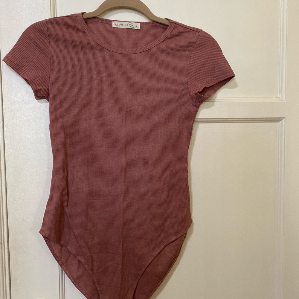 Forever 21 level up mauve waffle knit bodysuit.